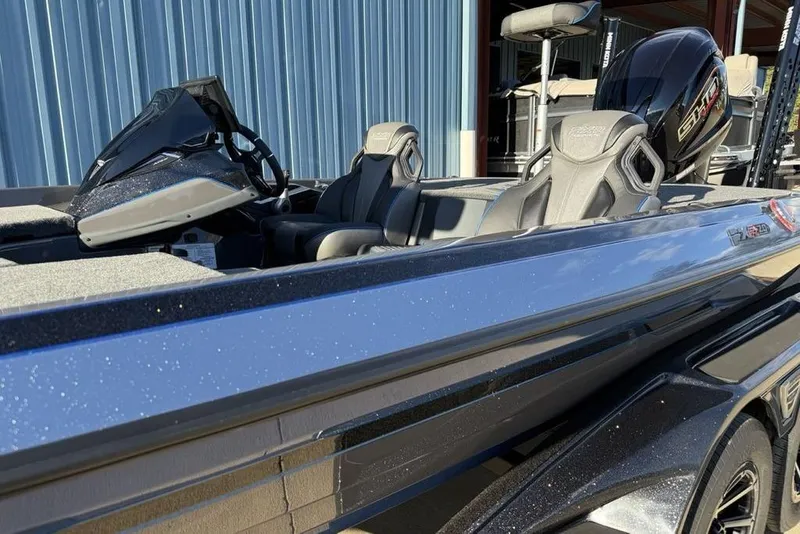 Slide: The Image of 2026 Skeeter FXR20 Apex boat with sleek design and modern features. - 4