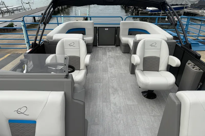 Slide: The Image of 2026 Qwest E-CLASS 22 RLS pontoon boat interior with luxurious seating and modern design. - 14