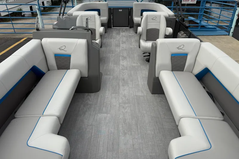 Slide: The Image of Luxurious interior of 2026 Qwest E-CLASS 22 RLS pontoon boat with stylish seating. - 15