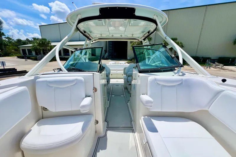 Slide: The Image of 2019 Robalo R317 Dual Console boat with spacious seating and sleek design. - 15