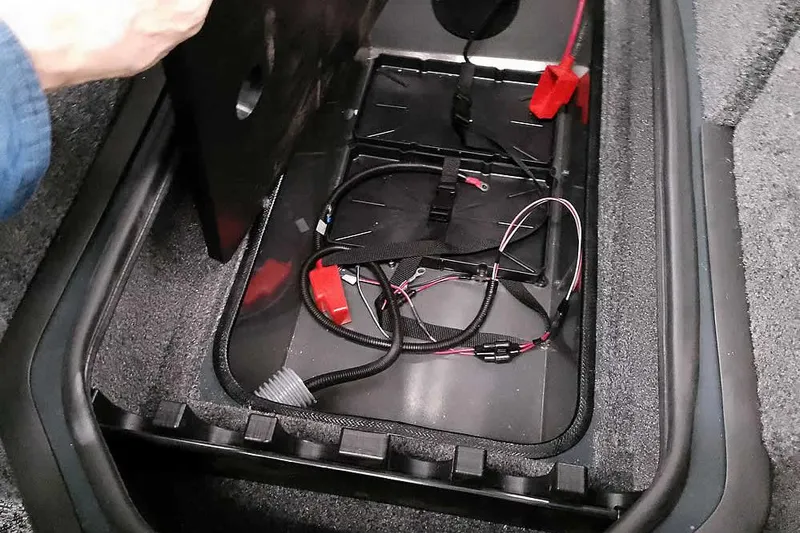 Slide: The Image of Ranger VX1988 WT 2026 vehicle compartment with wiring and cables exposed. - 13