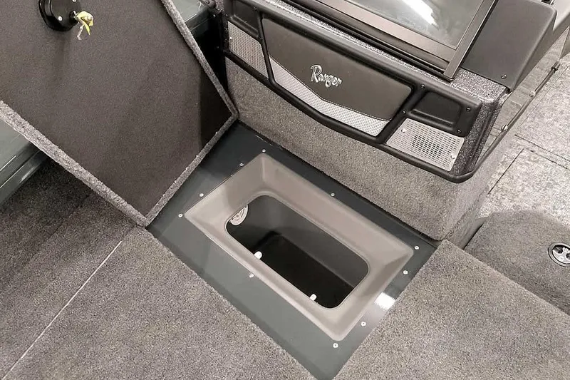 Slide: The Image of Interior of 2026 Ranger VX1988 WT boat with storage compartment open. - 14