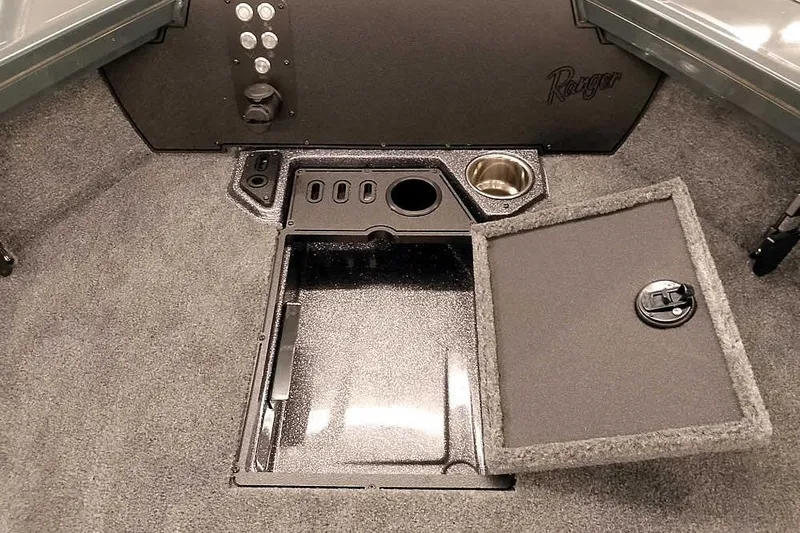 Slide: The Image of Interior of 2026 Ranger VX1988 WT boat with storage compartment and cup holder. - 18