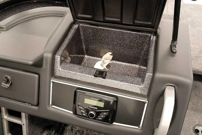 Slide: The Image of 2026 Ranger VX1988 WT boat console with storage compartment and audio system. - 22