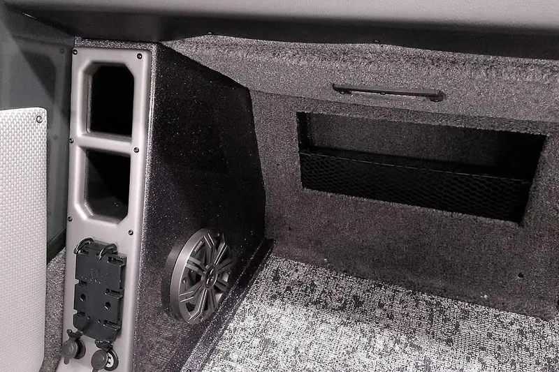 Slide: The Image of Interior of 2026 Ranger VX1988 WT boat with speaker and storage compartments. - 24