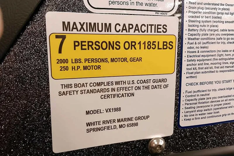 Slide: The Image of Boat capacity label for Ranger VX1988 WT, 2026 model, 7 persons or 1185 lbs, 250 HP motor. - 25