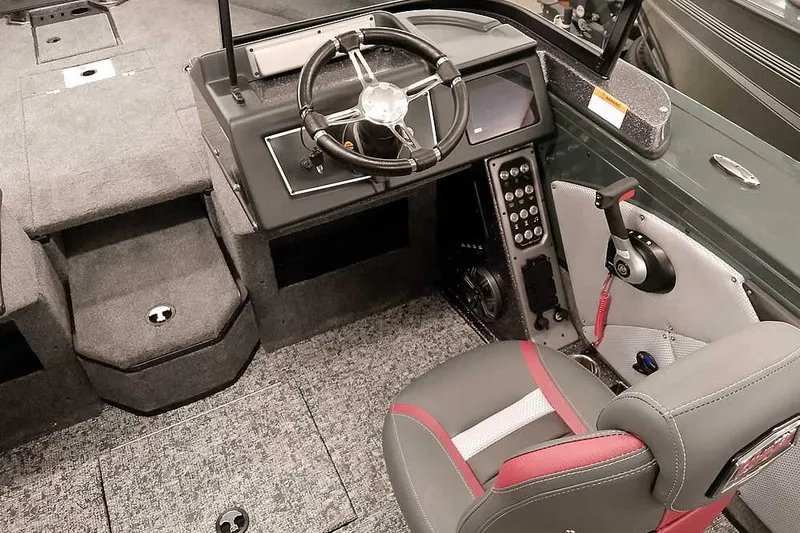 Slide: The Image of Interior of 2026 Ranger VX1988 WT boat with steering wheel and control panel. - 26