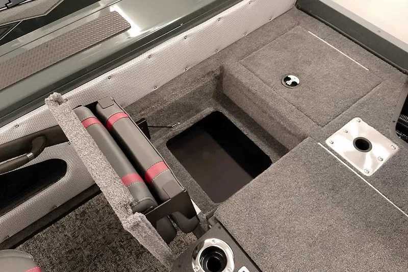 Slide: The Image of Interior of 2026 Ranger VX1988 WT boat with storage compartments and seating. - 35