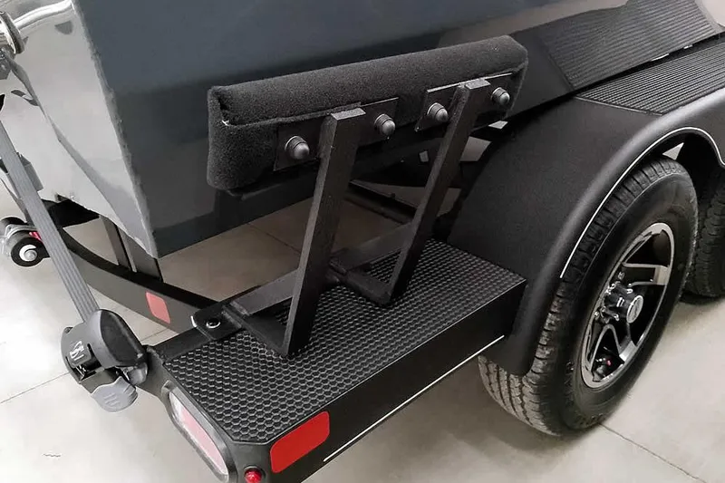 Slide: The Image of Rear view of 2026 Ranger VX1988 WT trailer with padded support and dual wheels. - 8