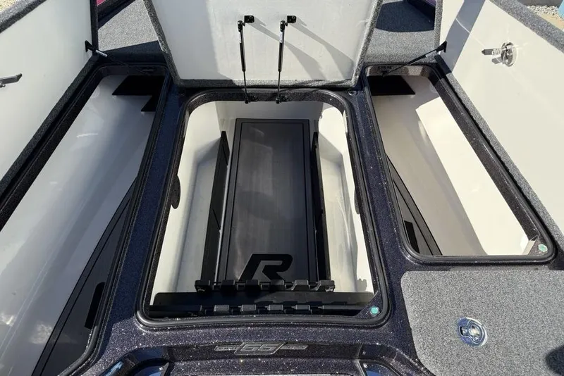 Slide: The Image of 2023 Ranger Z520R Ranger Cup Equipped boat storage compartments open. - 15