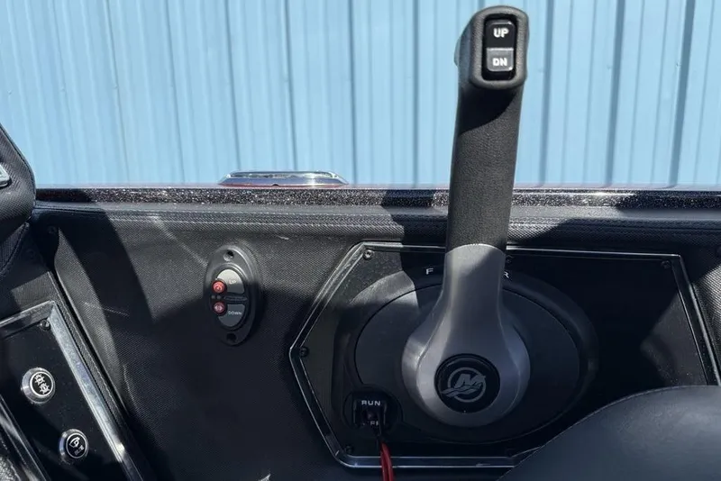 Slide: The Image of 2023 Ranger Z520R Ranger Cup boat controls with throttle lever and buttons. - 20