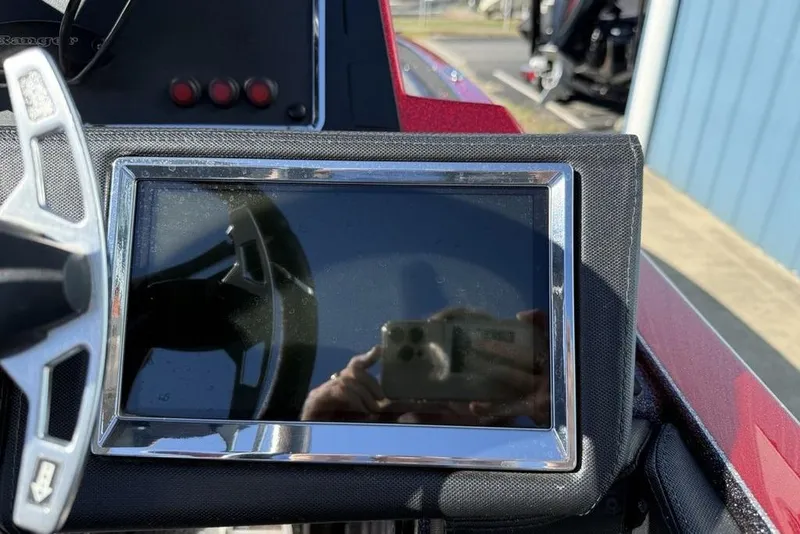 Slide: The Image of 2023 Ranger Z520R dashboard with touchscreen and steering wheel detail. - 21