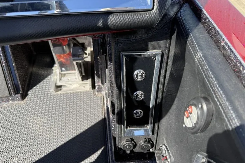 Slide: The Image of 2023 Ranger Z520R Ranger Cup Equipped boat dashboard controls and switches. - 22