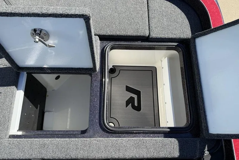 Slide: The Image of 2023 Ranger Z520R Ranger Cup Equipped storage compartments with open lids. - 28