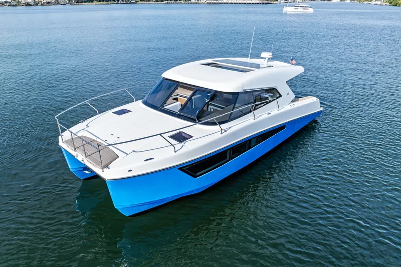 The Image of 2025 Makai M37 catamaran with sleek design, cruising on calm waters. - 0