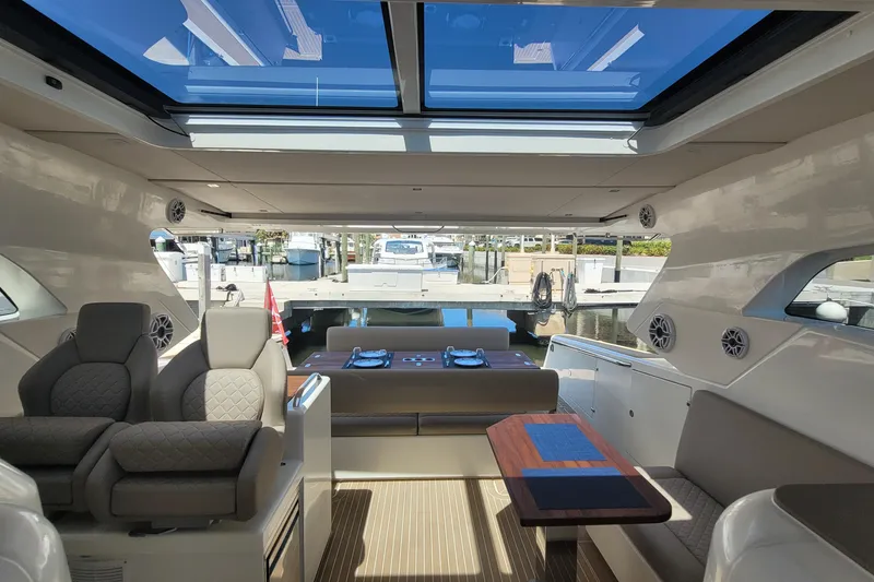 Slide: The Image of Luxurious interior of 2025 Makai M37 yacht with panoramic sunroof and elegant seating. - 14
