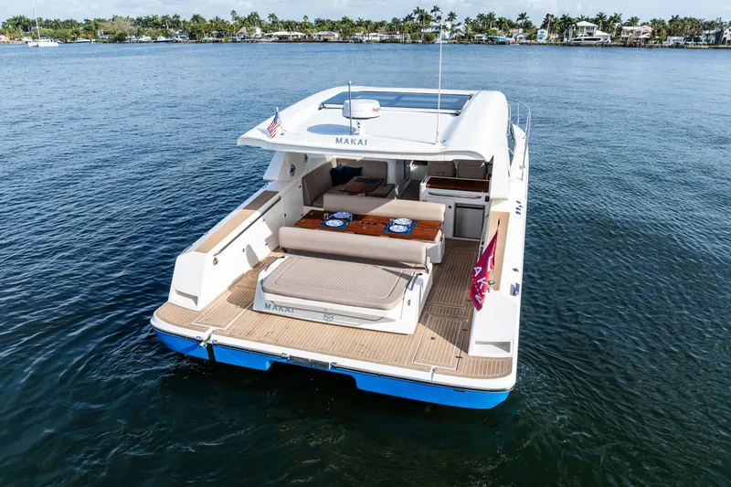 Slide: The Image of Luxury Makai M37 yacht cruising on serene waters, 2025 model. - 22