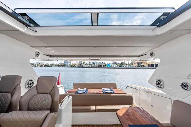 Slide: The Image of Luxurious interior of 2025 Makai M37 yacht with waterfront view and elegant seating. - 38