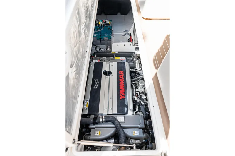 Slide: The Image of Engine compartment of 2025 Makai M37 featuring Yanmar engine components. - 49