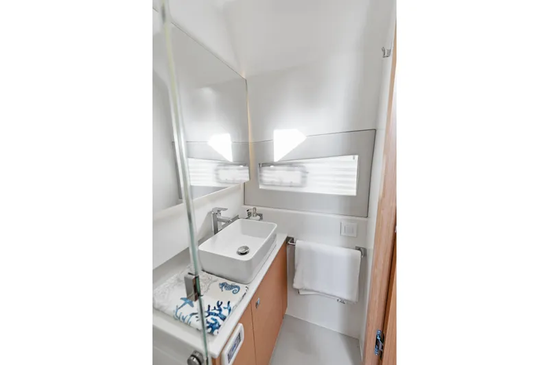 Slide: The Image of Modern bathroom interior in 2025 Makai M37, featuring sleek sink and mirror design. - 54