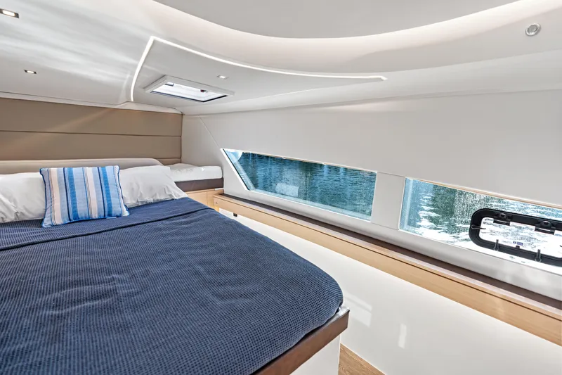 Slide: The Image of Luxurious cabin interior of 2025 Makai M37 yacht with scenic water view. - 66