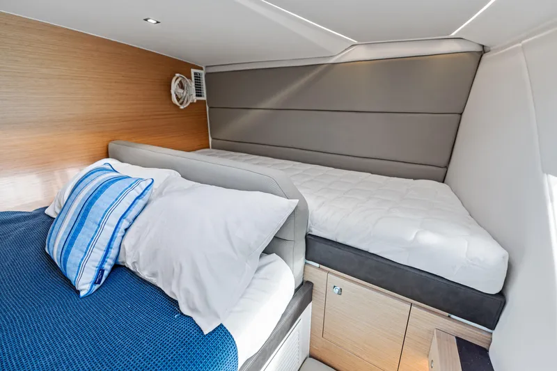 Slide: The Image of Interior cabin of 2025 Makai M37 with cozy bedding and modern design. - 70