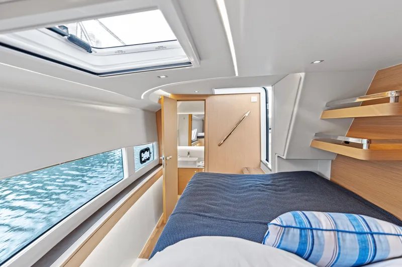 Slide: The Image of Luxurious interior of 2025 Makai M37 yacht with modern design and comfortable bedding. - 71