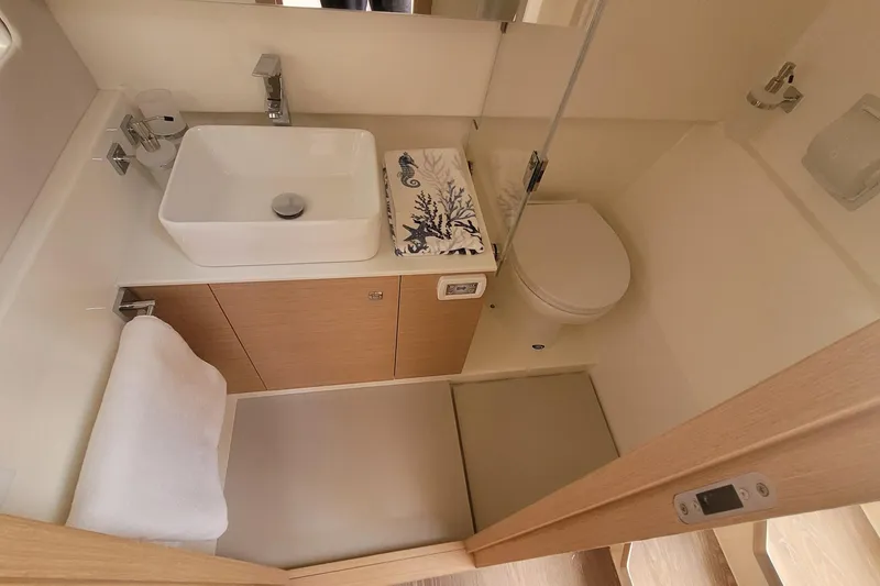 Slide: The Image of Modern bathroom in 2025 Makai M37 yacht with sleek sink and compact design. - 78