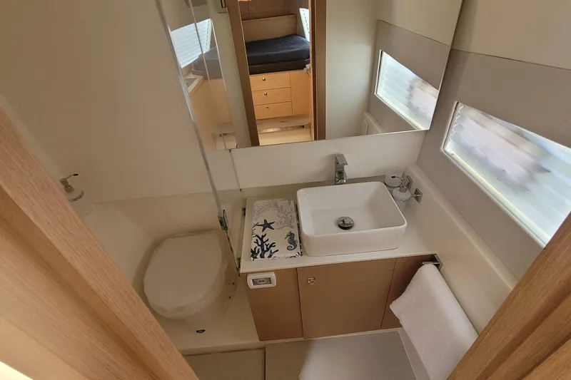 Slide: The Image of Modern bathroom in 2025 Makai M37 yacht with sleek sink and compact design. - 82