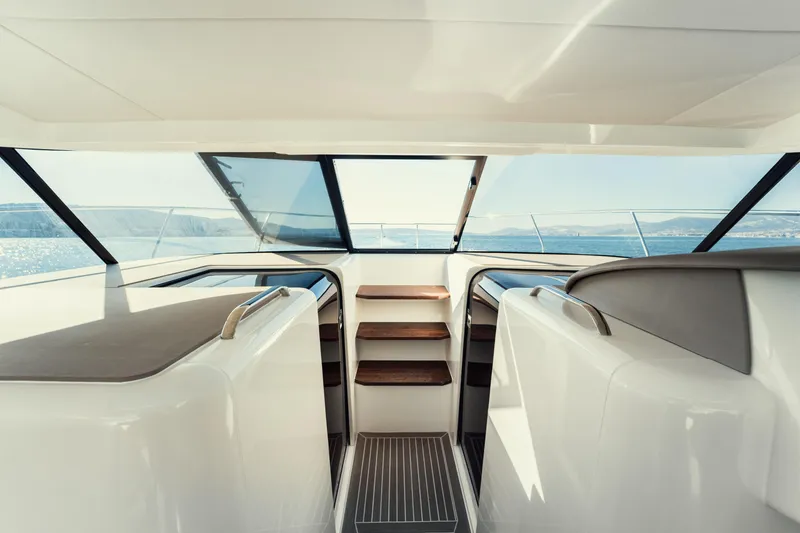 Slide: The Image of Interior view of 2025 Makai M37 yacht, featuring sleek design and panoramic windows. - 94