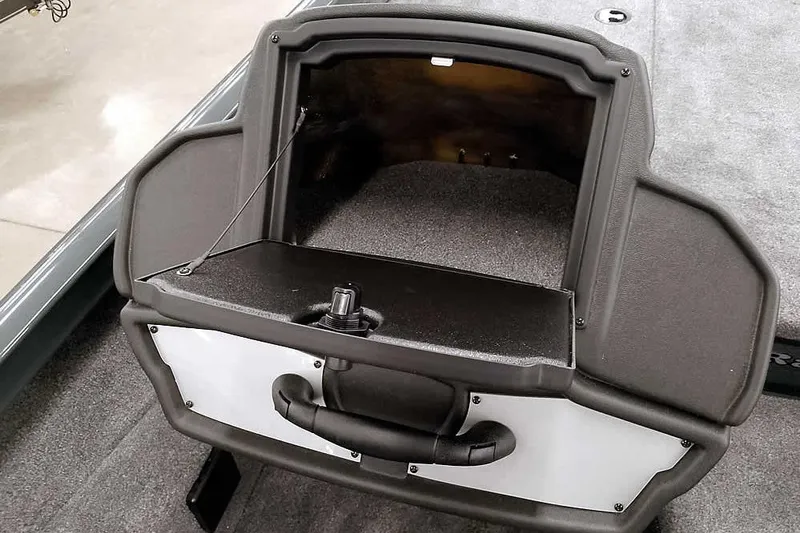 Slide: The Image of 2026 Ranger RT198P Fishing Package storage compartment with open lid, showcasing interior space. - 22
