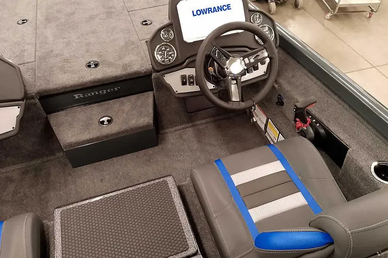 Slide: The Image of 2026 Ranger RT198P Fishing Package interior with steering wheel and seating. - 24