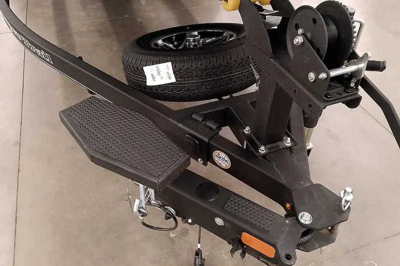 Slide: The Image of 2026 Ranger RT198P Fishing Package trailer hitch and spare tire detail. - 5