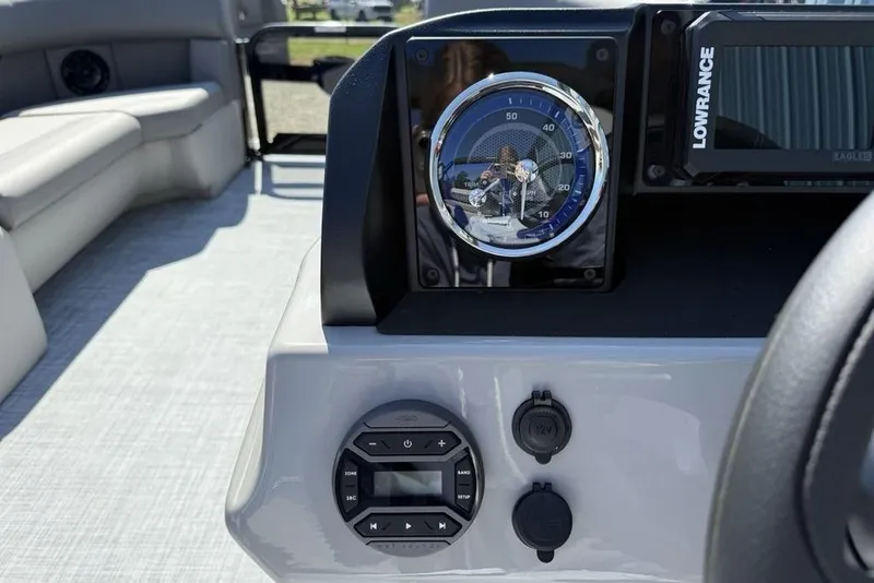 Slide: The Image of Dashboard of 2026 Premier 220 SUNSCAPE RL boat with gauges and controls. - 15