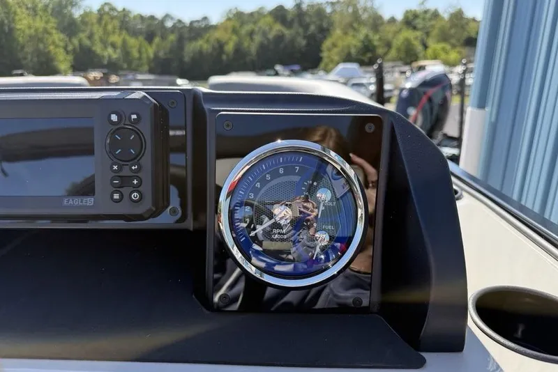 Slide: The Image of Dashboard of 2026 Premier 220 SUNSCAPE RL boat with gauges and controls. - 16