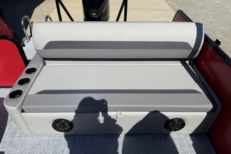 Slide: The Image of 2026 Premier 220 SUNSCAPE RL boat seating with cup holders and speakers. - 18