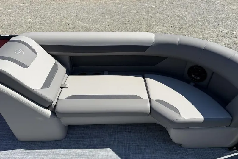 Slide: The Image of 2026 Premier 220 SUNSCAPE RL boat seating with gray upholstery and modern design. - 6