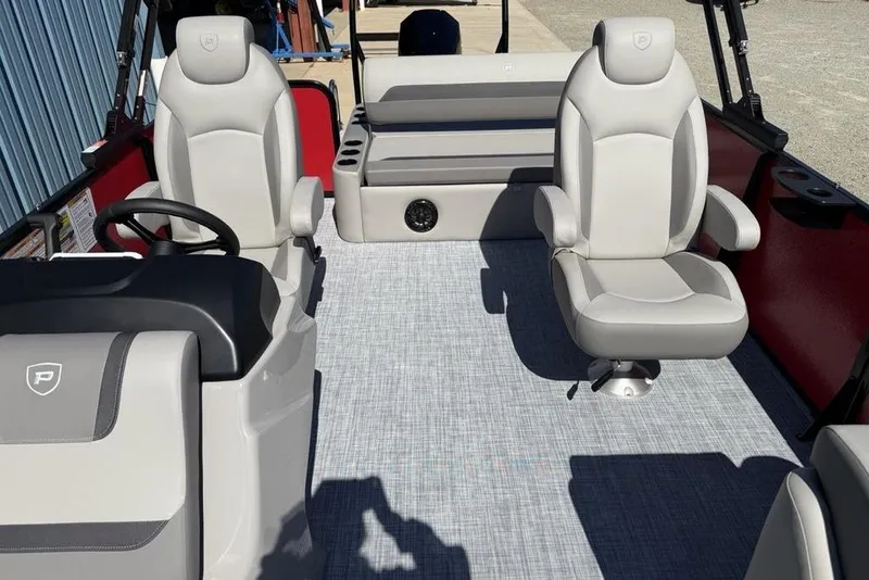 Slide: The Image of 2026 Premier 220 SUNSCAPE RL boat interior with plush seating and modern design. - 8