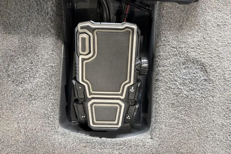Slide: The Image of 2024 Phoenix 919 Pro XP boat pedal on textured carpet flooring. - 10