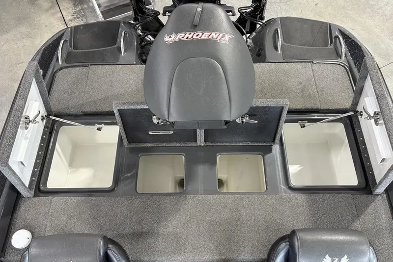 Slide: The Image of 2024 Phoenix 919 Pro XP boat interior with storage compartments and seating. - 26