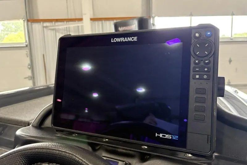 Slide: The Image of Lowrance HDS12 display on 2024 Phoenix 919 Pro XP boat dashboard. - 27