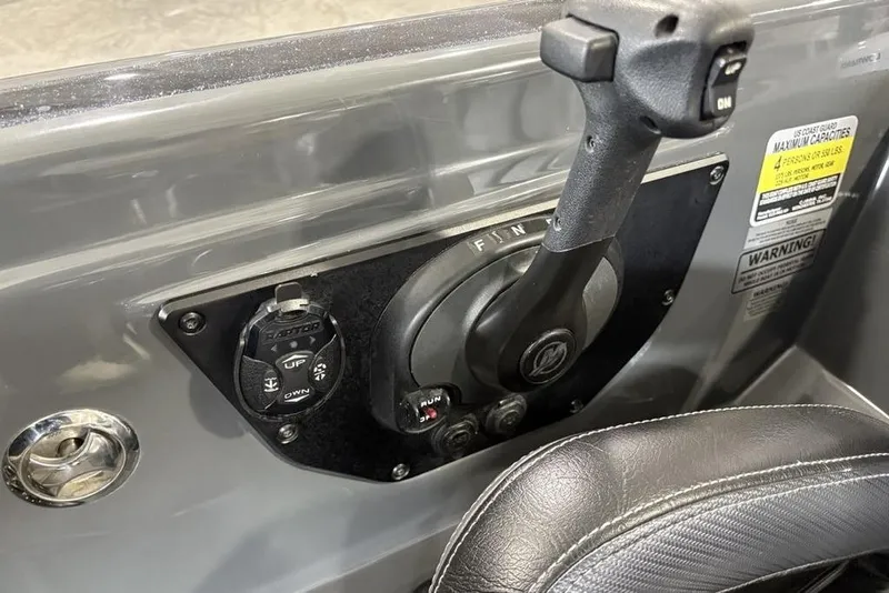 Slide: The Image of Control panel of 2024 Phoenix 919 Pro XP boat with throttle and switches. - 29