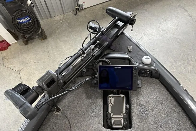 Slide: The Image of 2024 Phoenix 919 Pro XP boat with Lowrance electronics and trolling motor setup. - 3