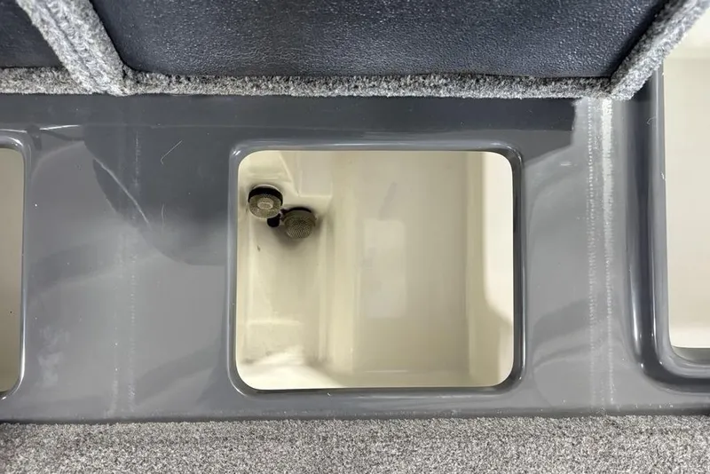 Slide: The Image of Storage compartment in a 2024 Phoenix 919 Pro XP boat. - 31