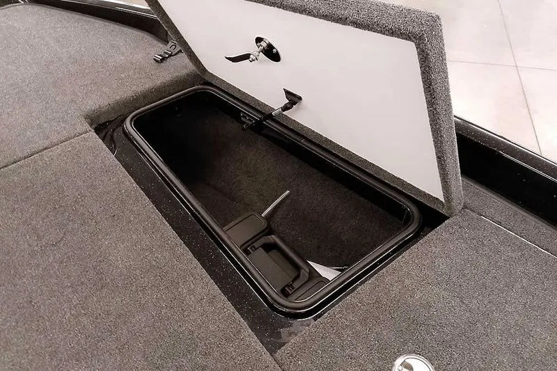 Slide: The Image of Open storage compartment in 2025 Ranger Z185 Z Pack Equipped boat. - 16