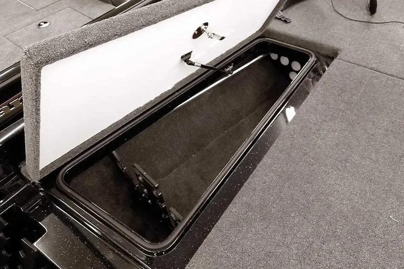 Slide: The Image of Open storage compartment in 2025 Ranger Z185 Z Pack Equipped boat. - 17