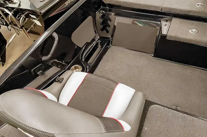 Slide: The Image of 2025 Ranger Z185 Z Pack boat interior with seating and storage compartments. - 21