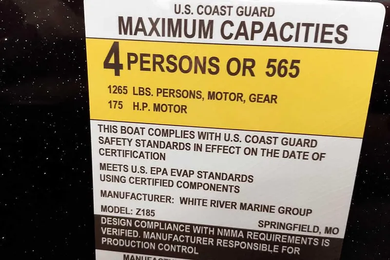 Slide: The Image of 2025 Ranger Z185 Z Pack boat capacity label, 4 persons, 1265 lbs, 175 HP motor compliance. - 22