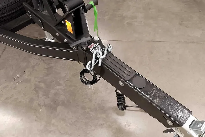 Slide: The Image of Trailer hitch of 2025 Ranger Z185 Z Pack Equipped on concrete floor. - 31