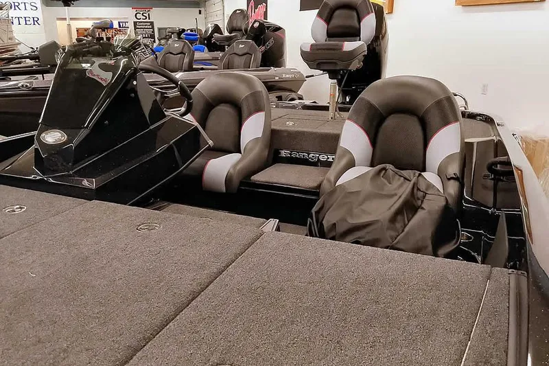 Slide: The Image of 2025 Ranger Z185 Z Pack Equipped boat interior with dual seats and steering console. - 8